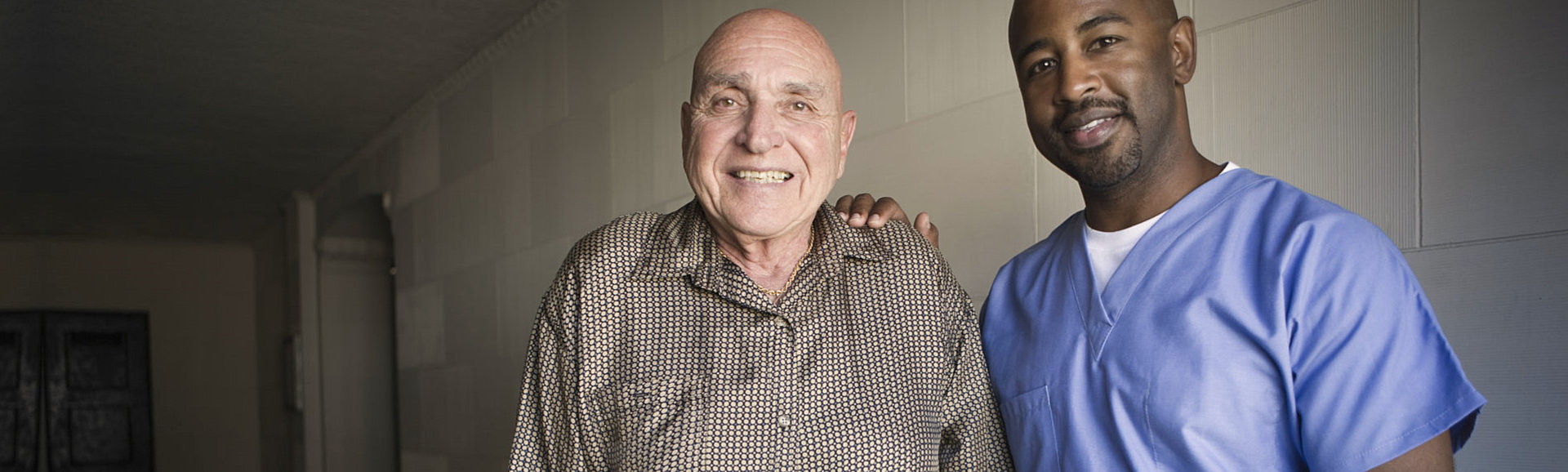 elderly couple smiling